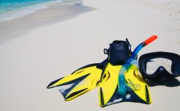 Diving Mask with fins on beach